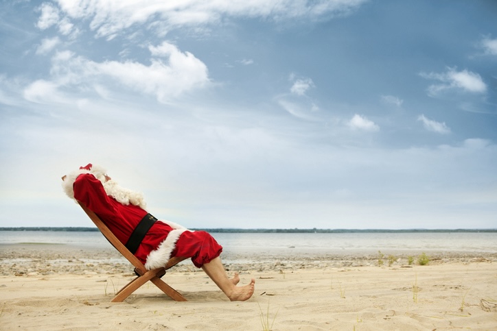 Santa with feet in the sand